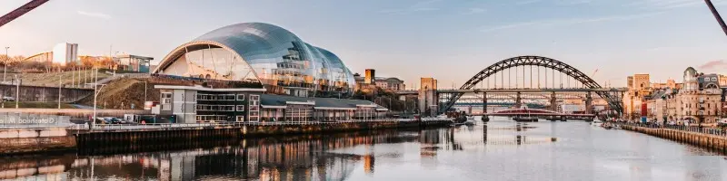 Newcastle's iconic Tyne Bridge and Quayside with the Millennium Bridge